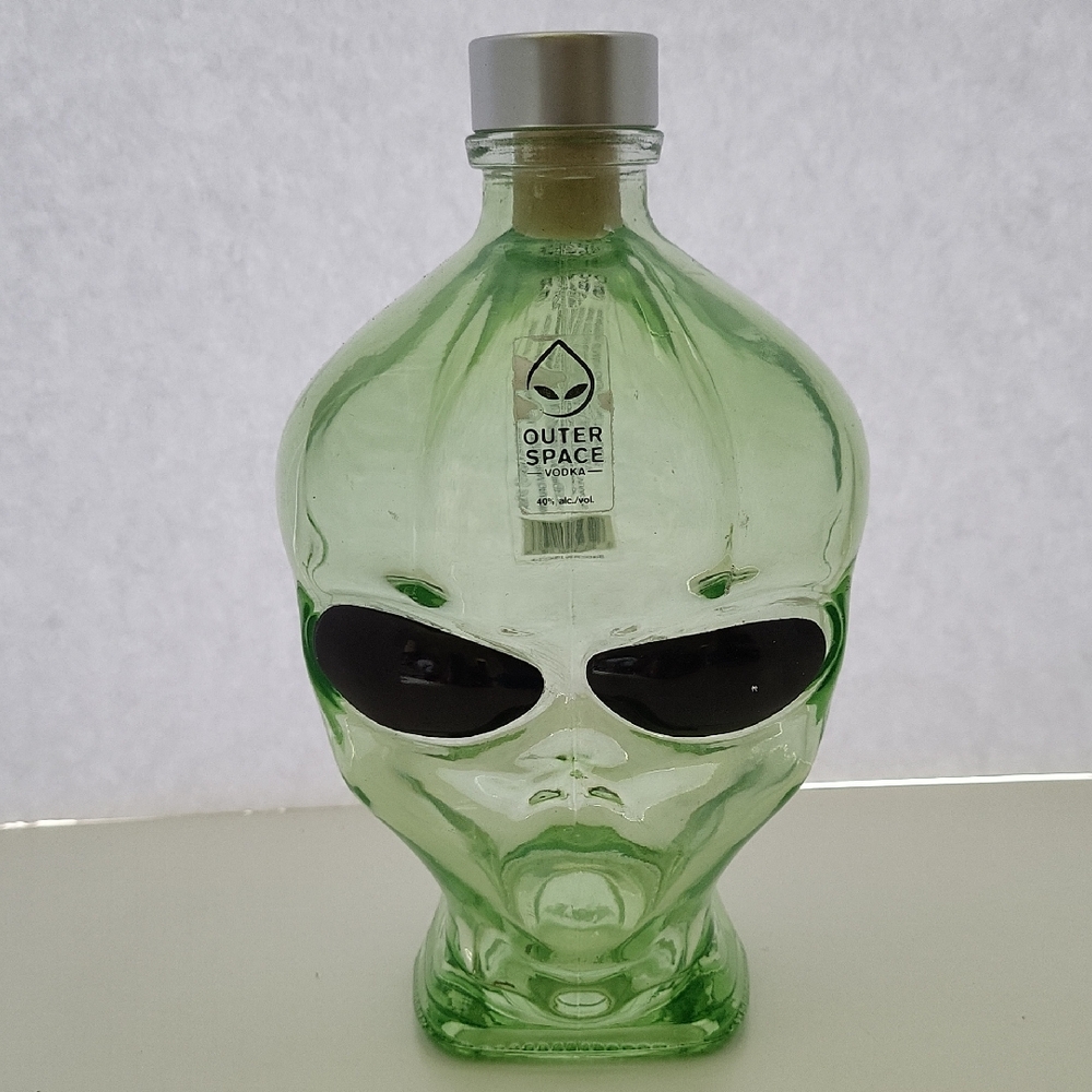 Empty Outer Space Alien Head Glass Bottle